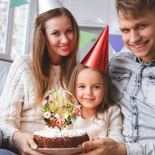 famille celebrant anniversaire avec decoration sur gateau